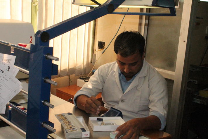 Dentist examining instruments at the clinic