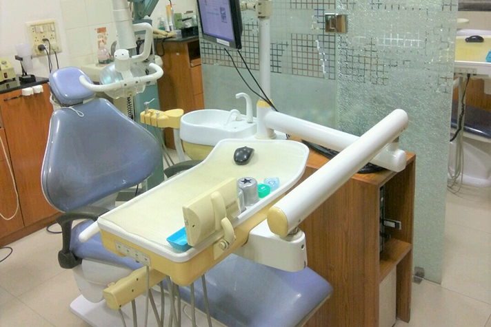 Dental treatment chair with equipment