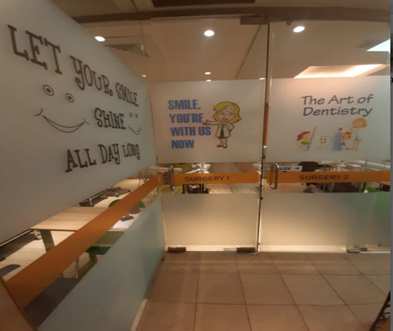Reception and waiting area with glass wall graphics