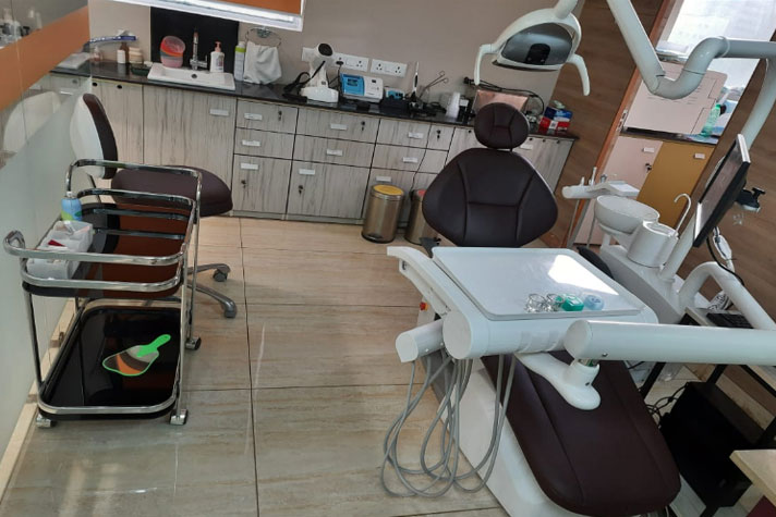 Dental treatment chair with storage cabinets